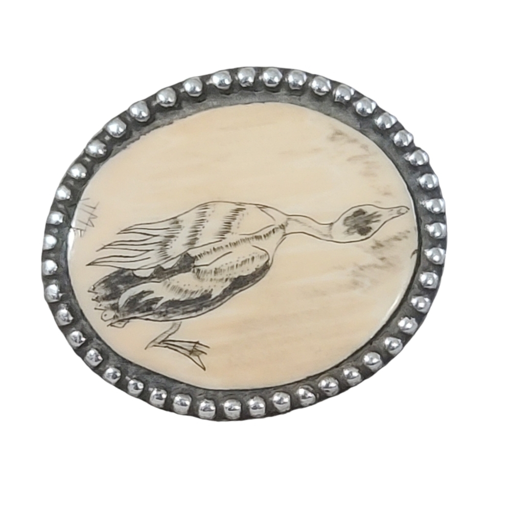 Vintage hand scrimshaw etching bird pin